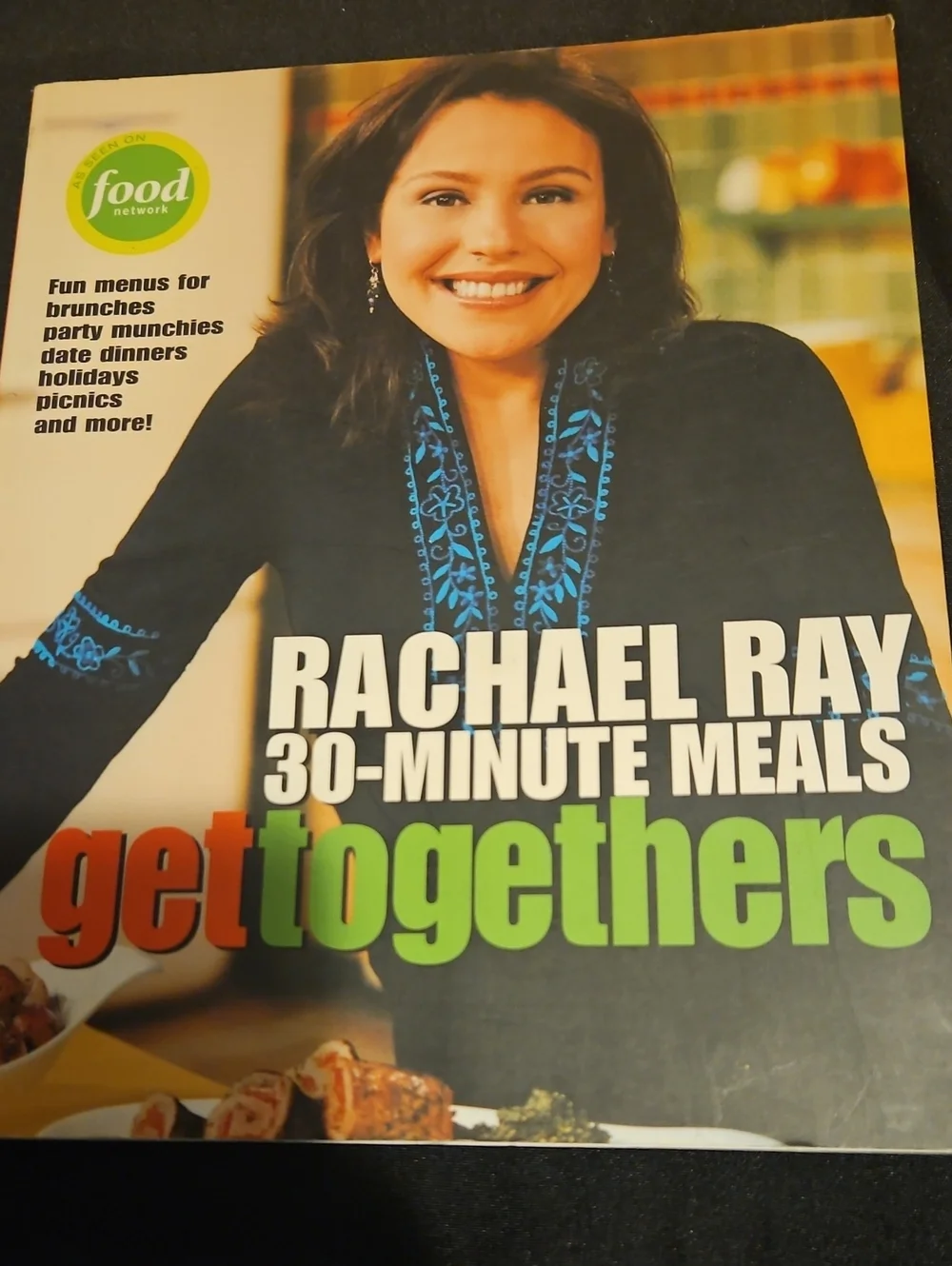 Rachael Ray Black Cover with Bright Blue Embroidery and Green Title